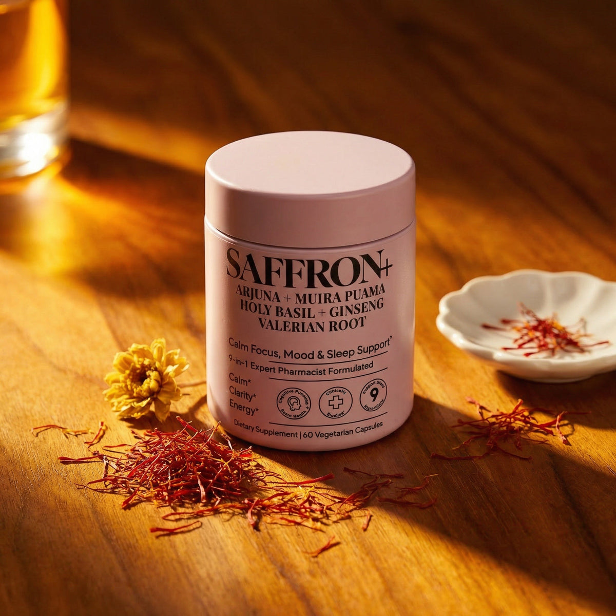 Green supplement powder in a ceramic dish on marble — the building blocks of a supplement stack